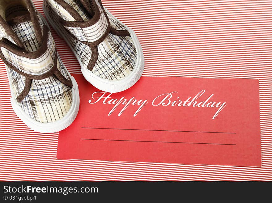 Postcard with birthday greetings and a number of shoes for your child. Postcard with birthday greetings and a number of shoes for your child