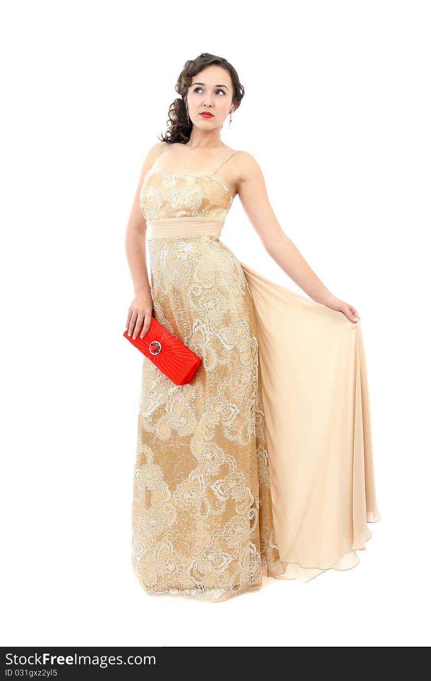 Attractive woman in elegant beige dress