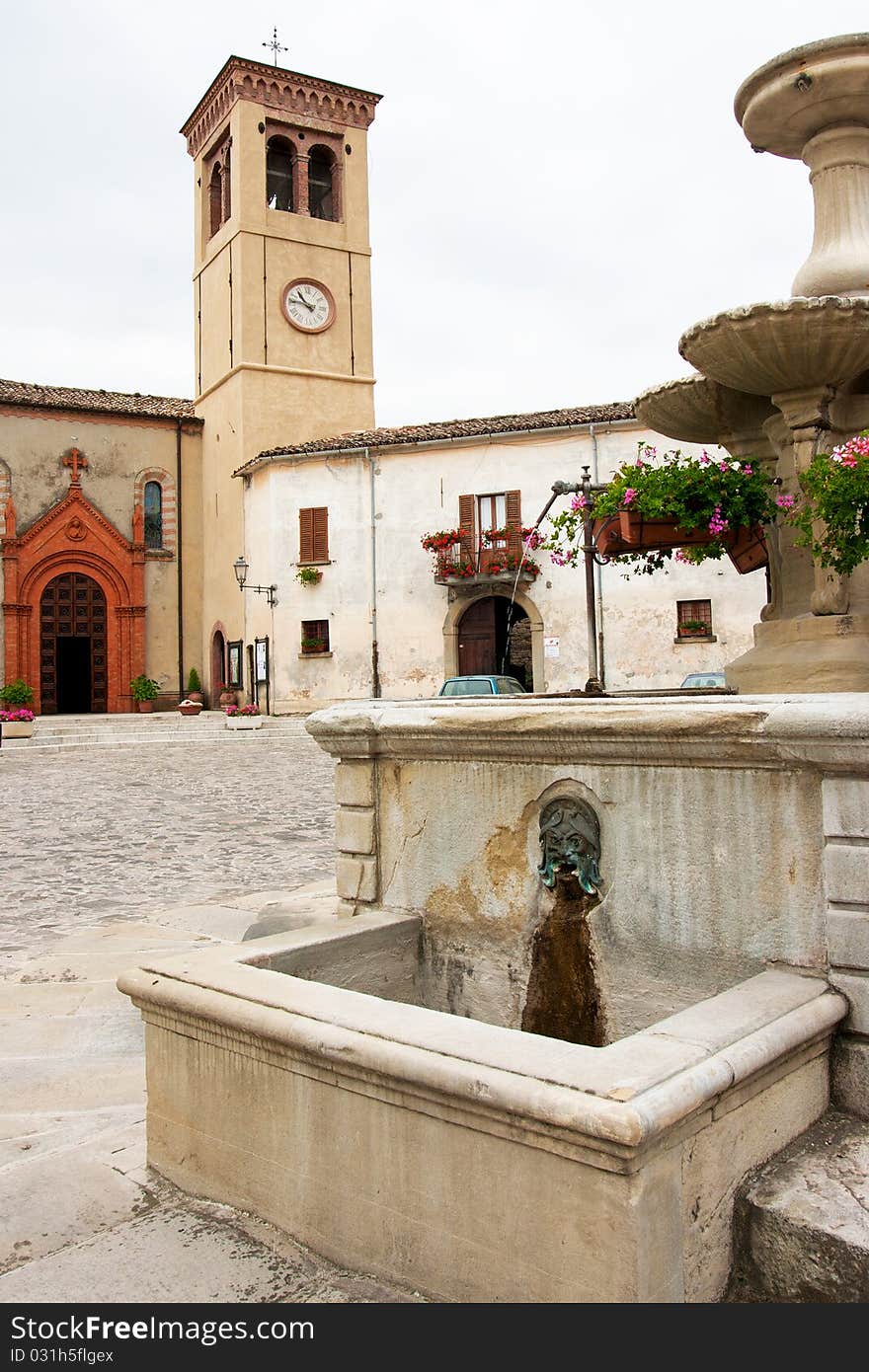 Market Place With Fountain In Italy