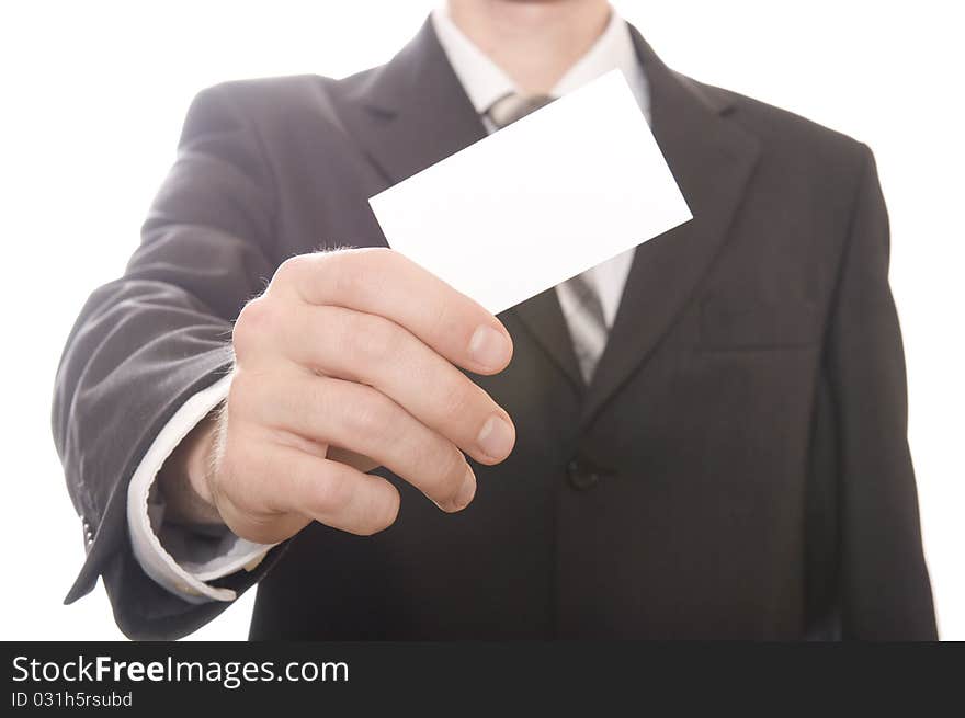 Business man handing a blank business card over white