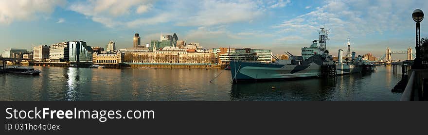 A view of the River Thames and HMS Belfast with Tower Bridge in the background, from London's South Bank. A view of the River Thames and HMS Belfast with Tower Bridge in the background, from London's South Bank.