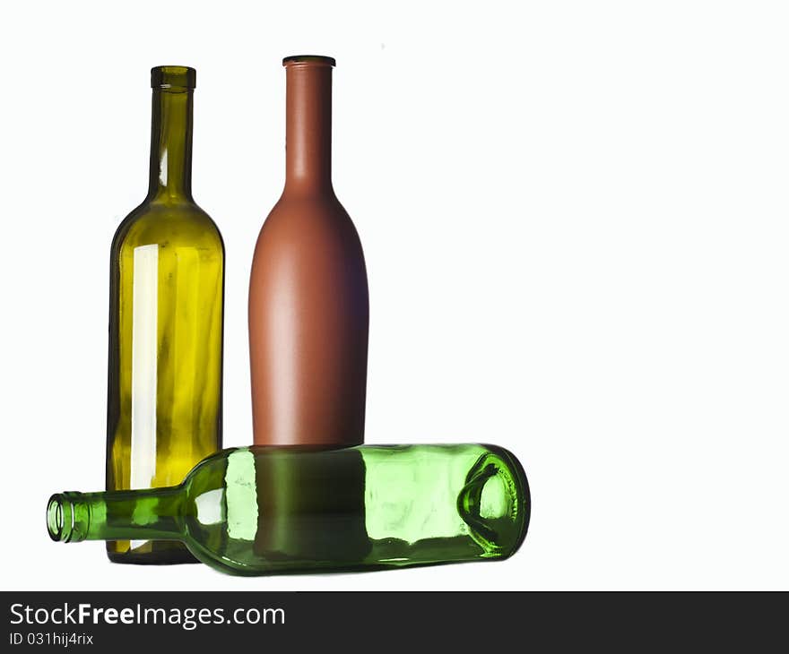 Three bottles on a white background