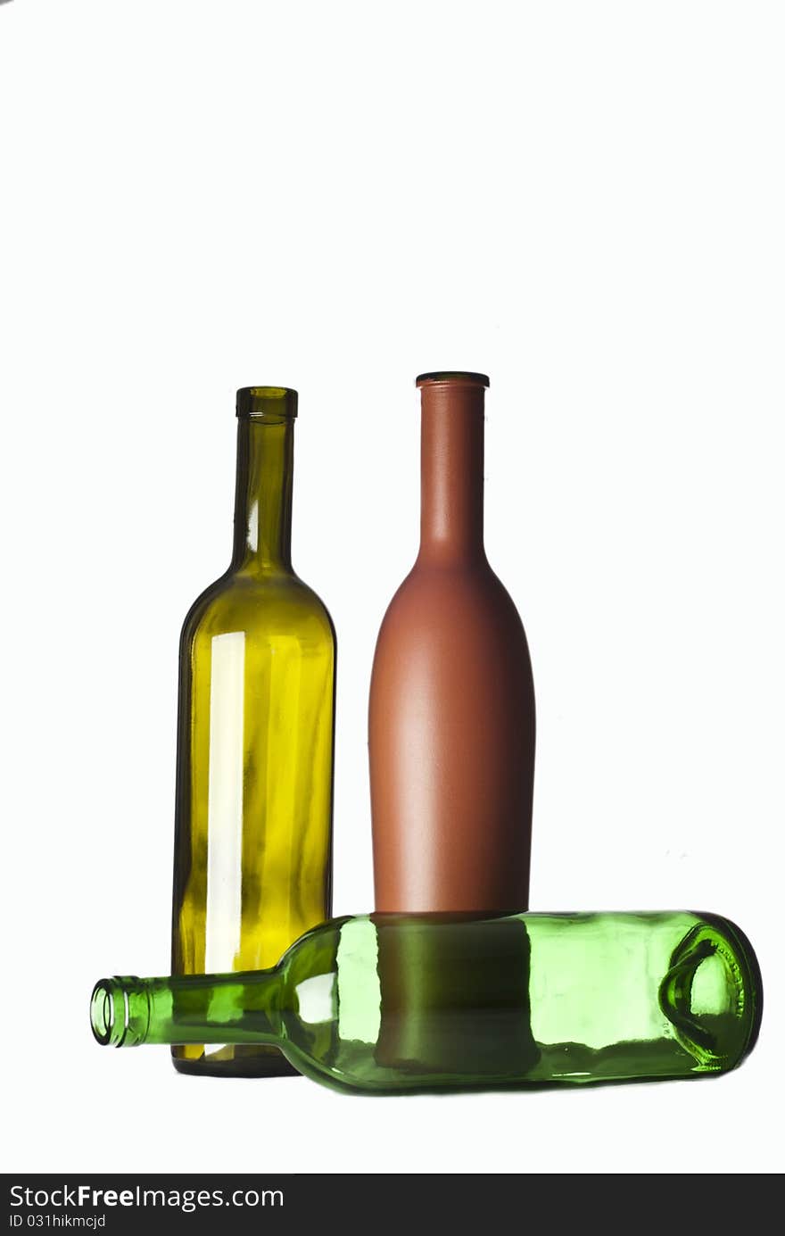 Three bottles on a white background