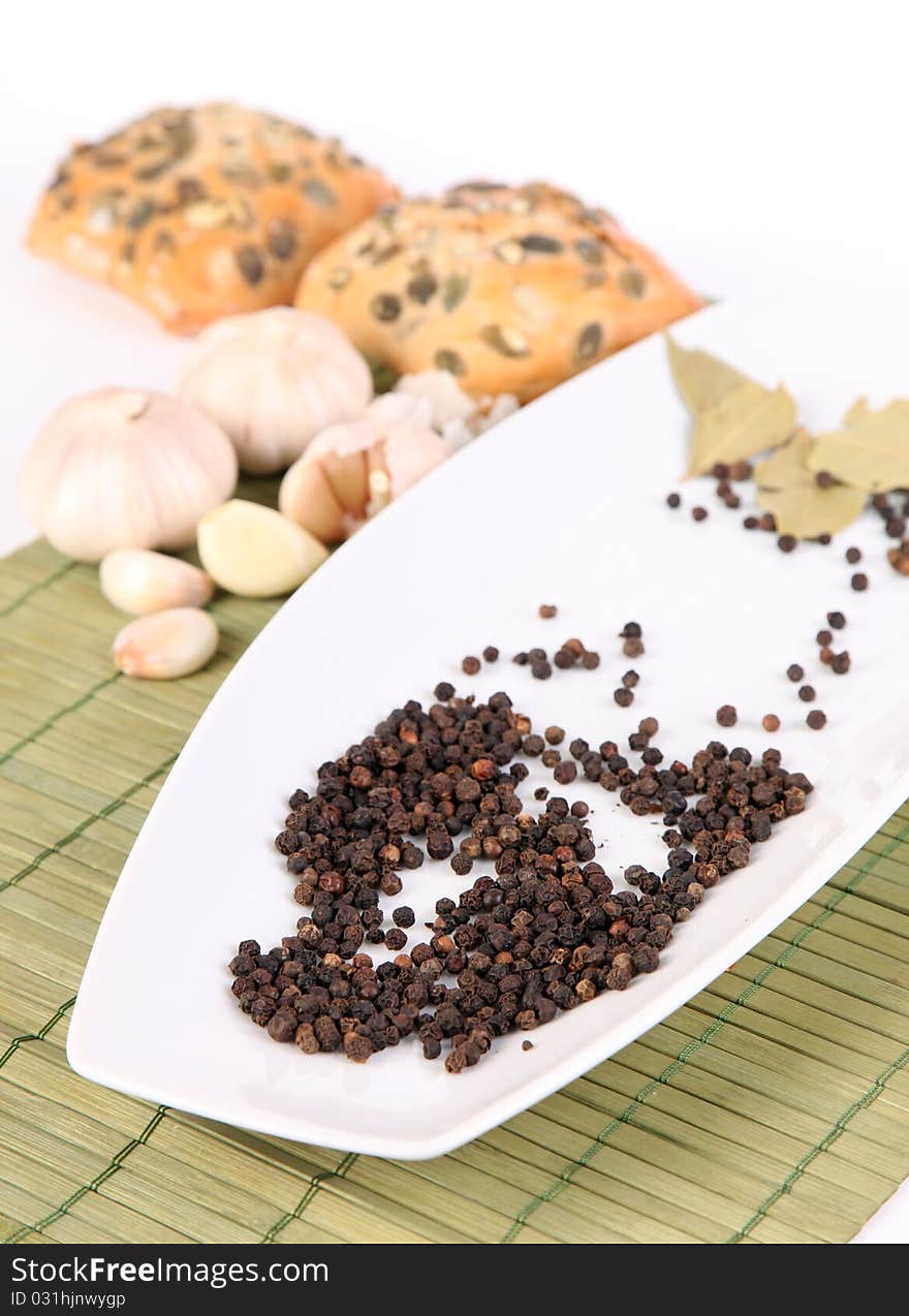 Black pepper on white plate