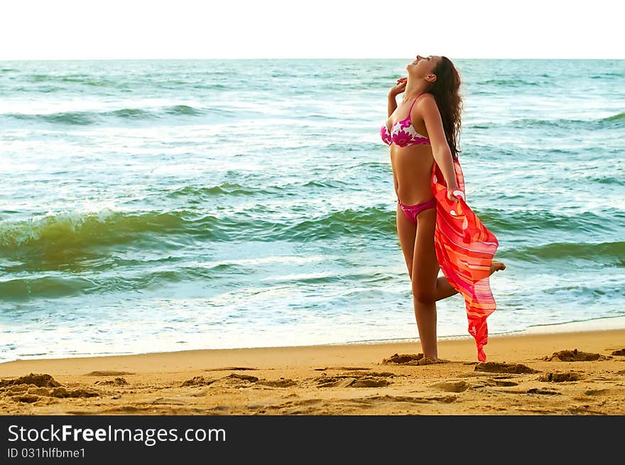 Young Woman On The Beach