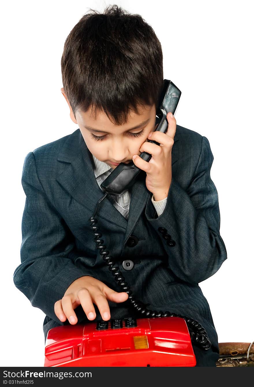 Young boy talking on the phone