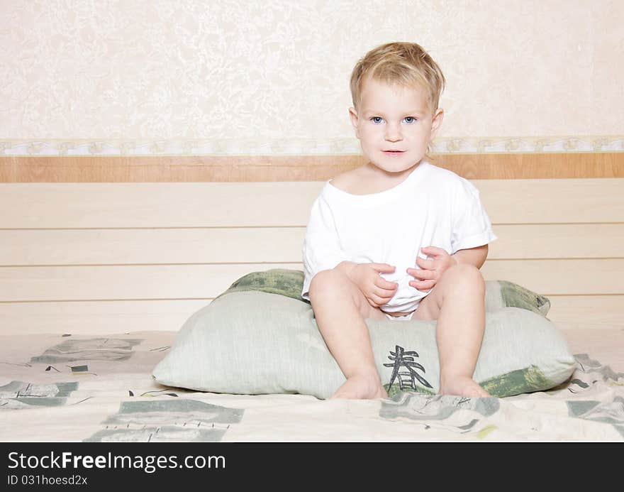 Cute child having fun in bed. Cute child having fun in bed