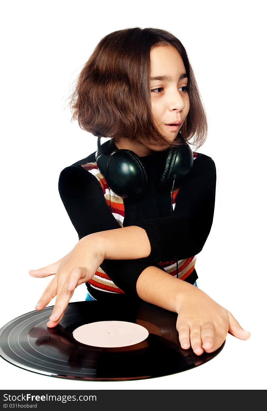 Photo portrait of beautiful preschool child with headphones and plate isolated on white background