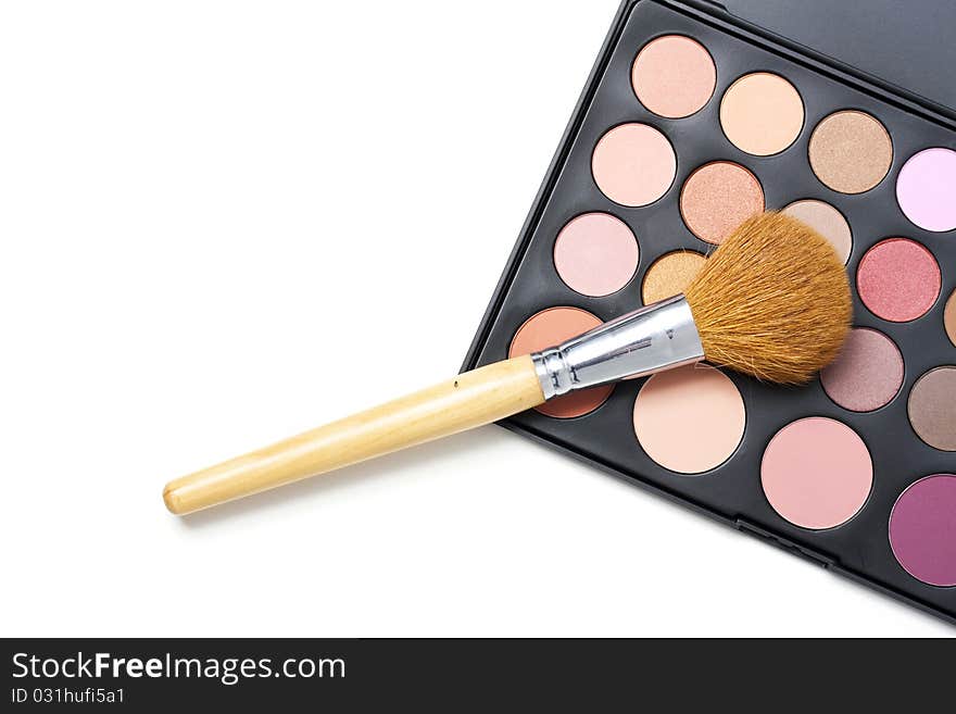 Professional makeup palette and thick brush