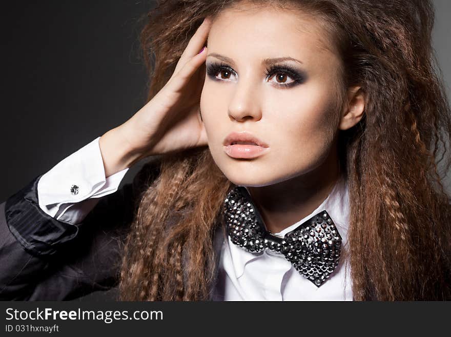 Elegant fashionable woman with bow-tie