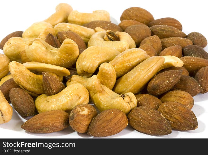 Group of dried almonds with salt