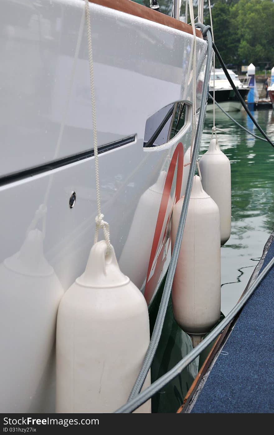 Floater of yacht in harbor