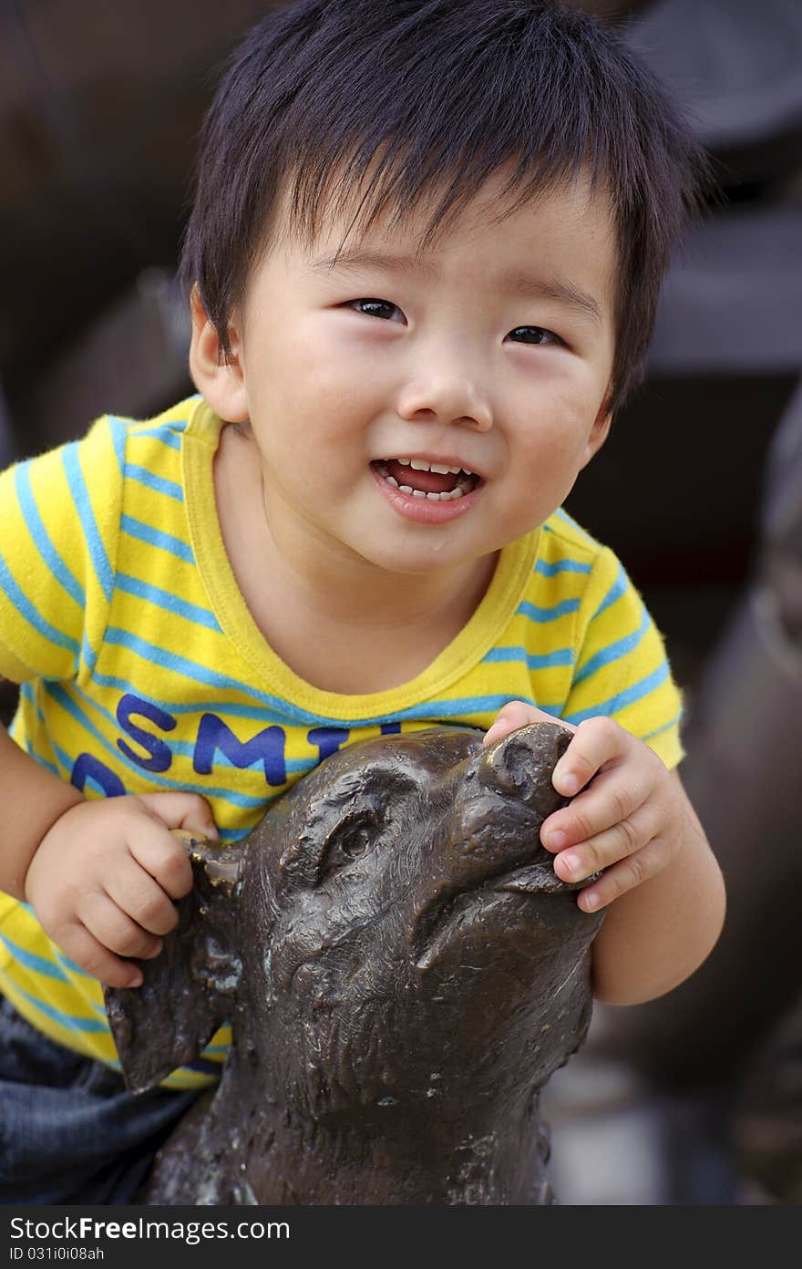 A happy baby is playing