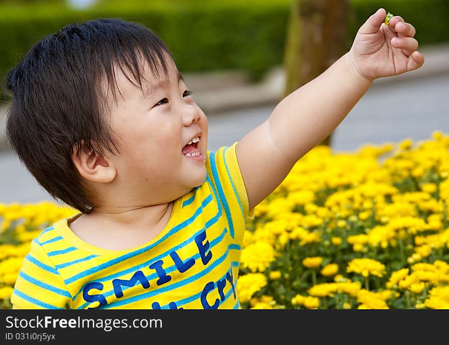 A happy baby is playing