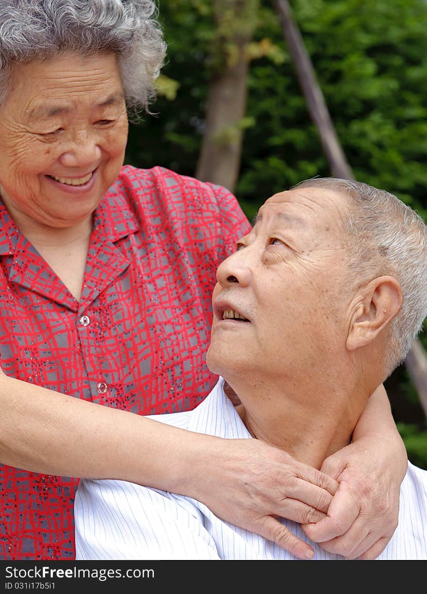 An intimate senior couple embraced. An intimate senior couple embraced