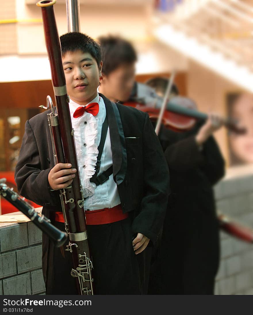 A bassoon boy in concert