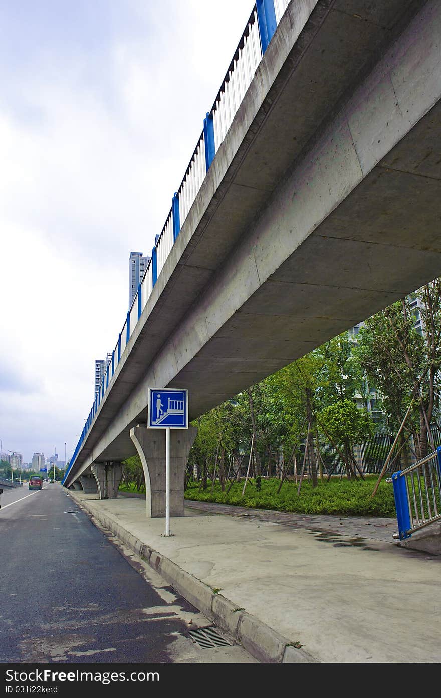 Urban roads under overpass pass the downtown