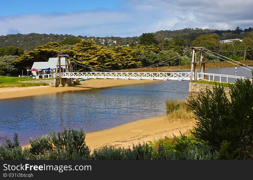 White bridge at green forest, in australia.