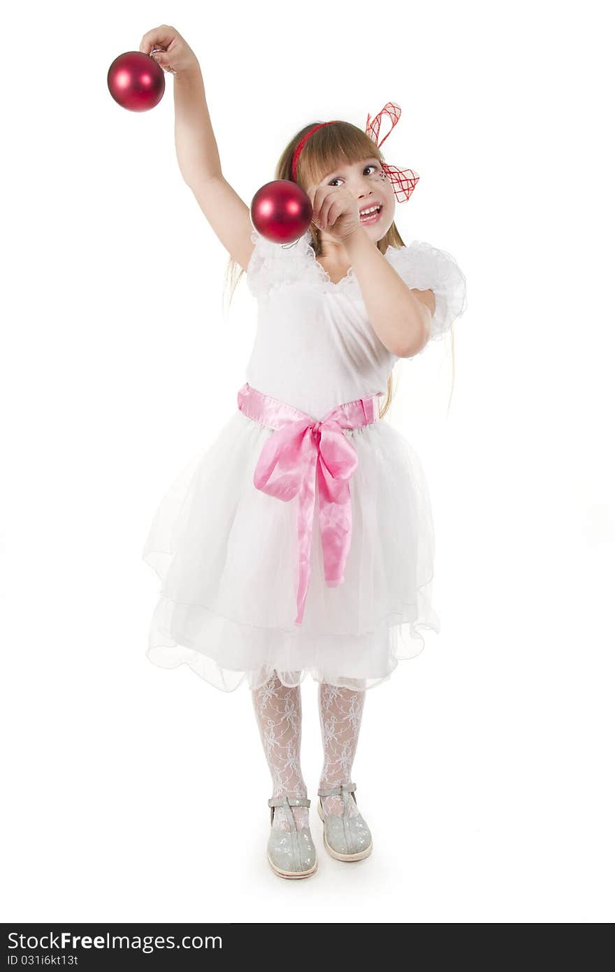 Girl plays with Christmas red ball