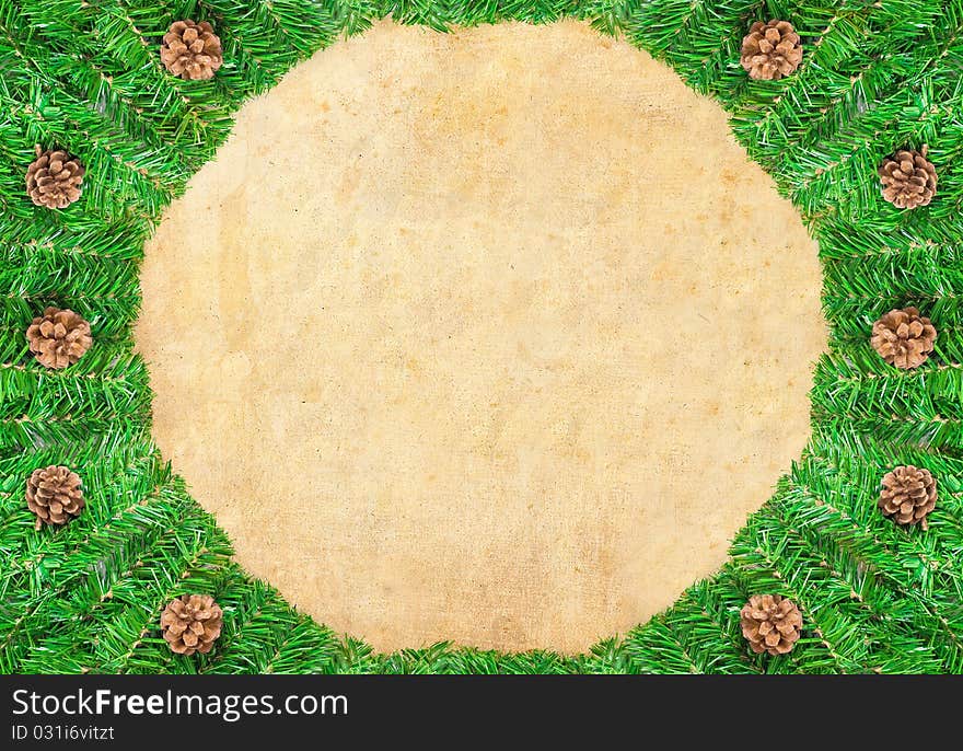 Christmas green framework with Pine needles and cones  isolated on paper textures background. Christmas green framework with Pine needles and cones  isolated on paper textures background