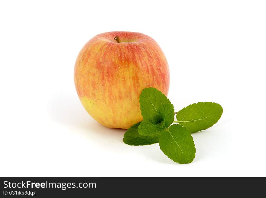 Apple with mint leaf