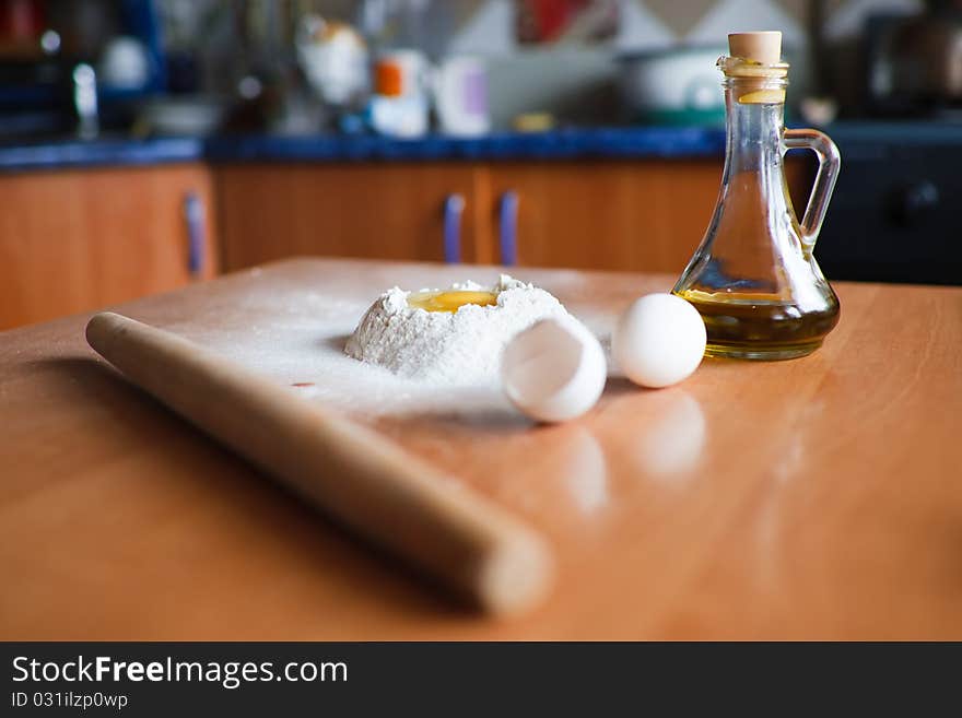 An image of eggs and flour and oil for baking. An image of eggs and flour and oil for baking