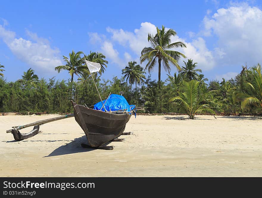 Fishing boat in a tropical beach