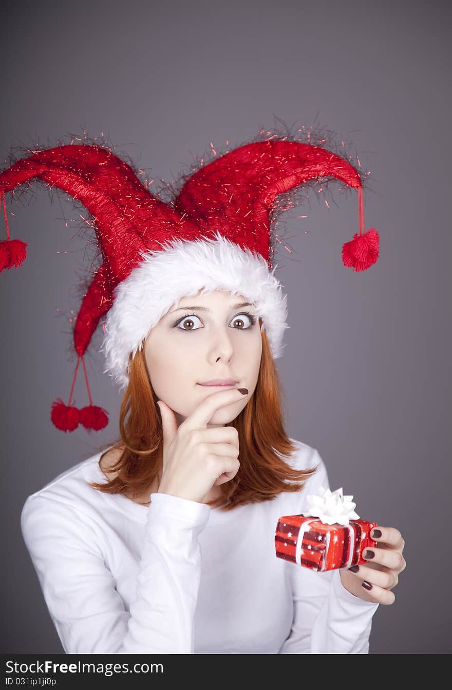 Funny Red-haired Girl In Christmas Cap