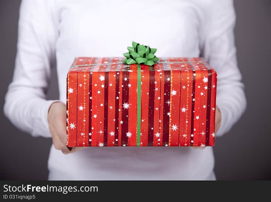 Girl Keeping Christmas Gift Box.