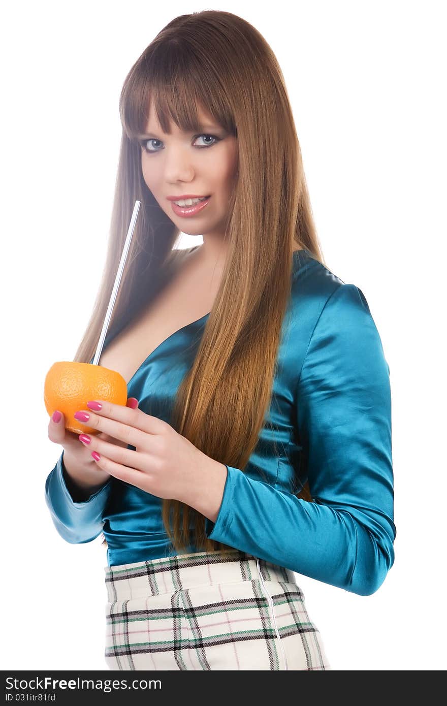 The girl with an orange, a tubule for drink on a white background