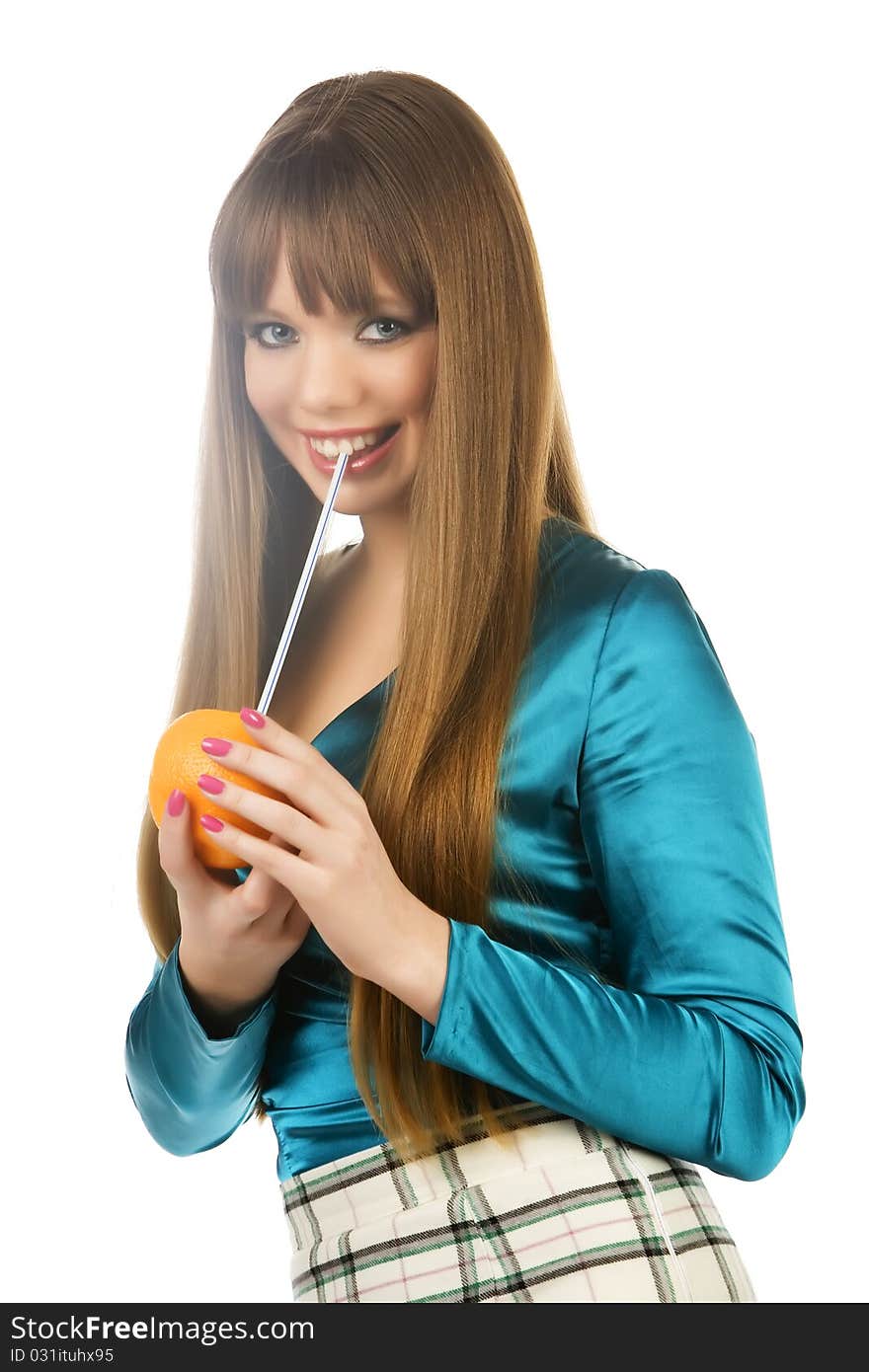 The girl with an orange, a tubule for drink on a white background