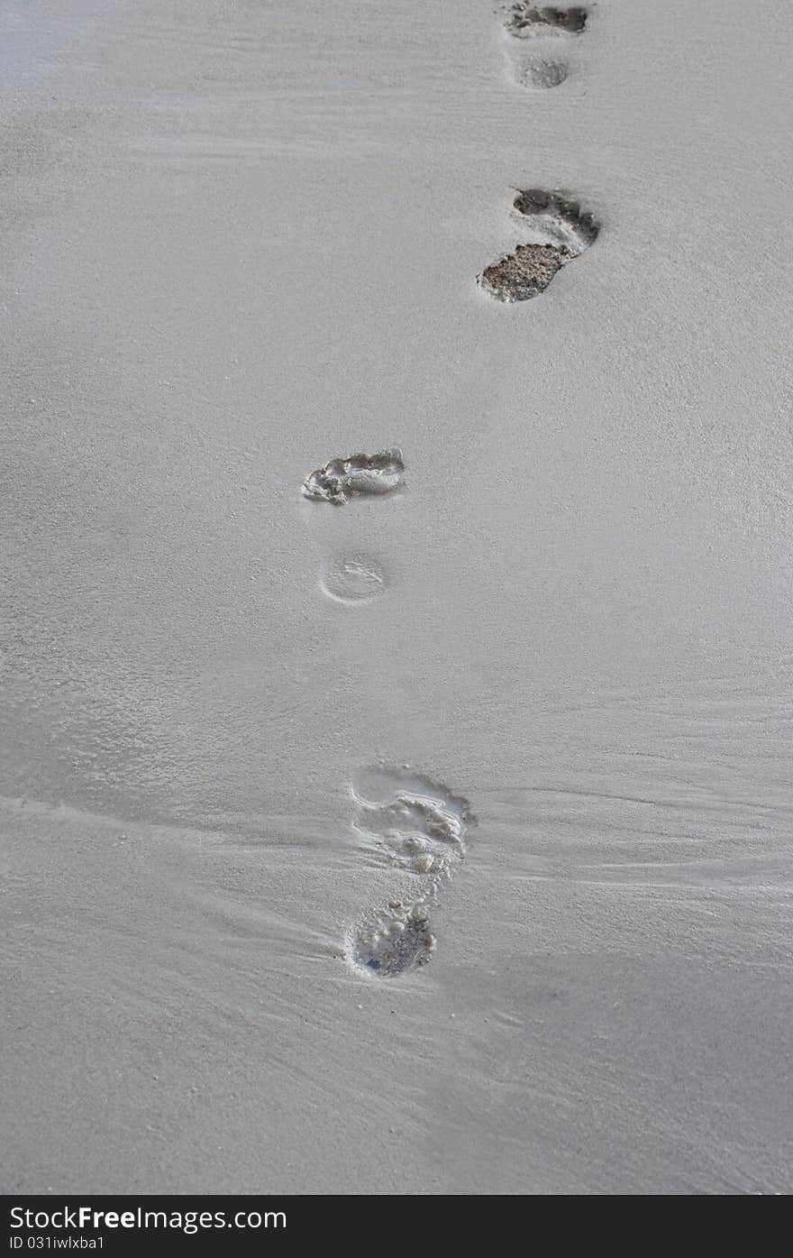 Footprints on a beach