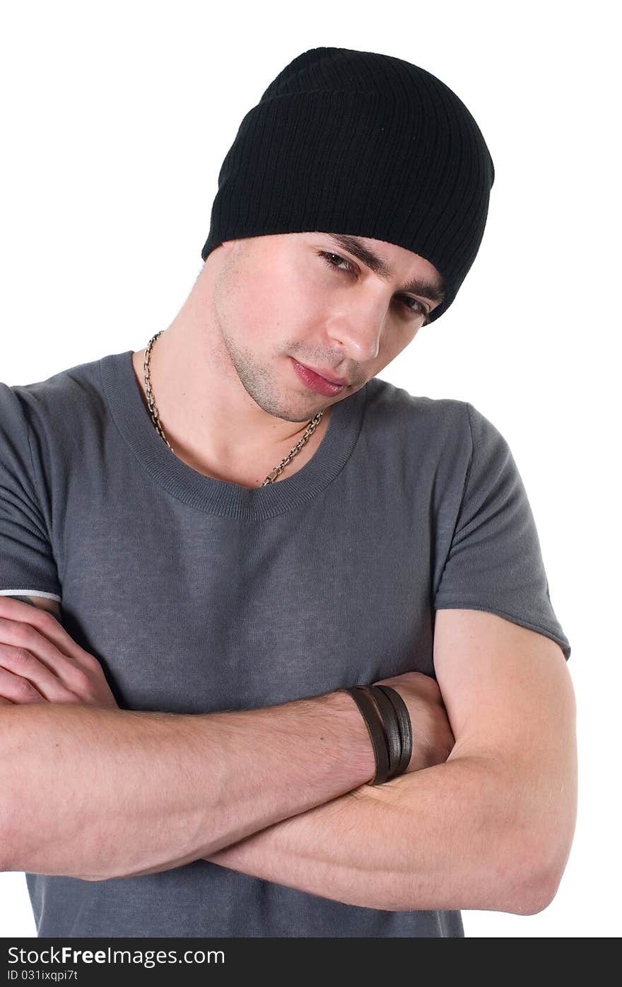 Beautiful young man in a black cap