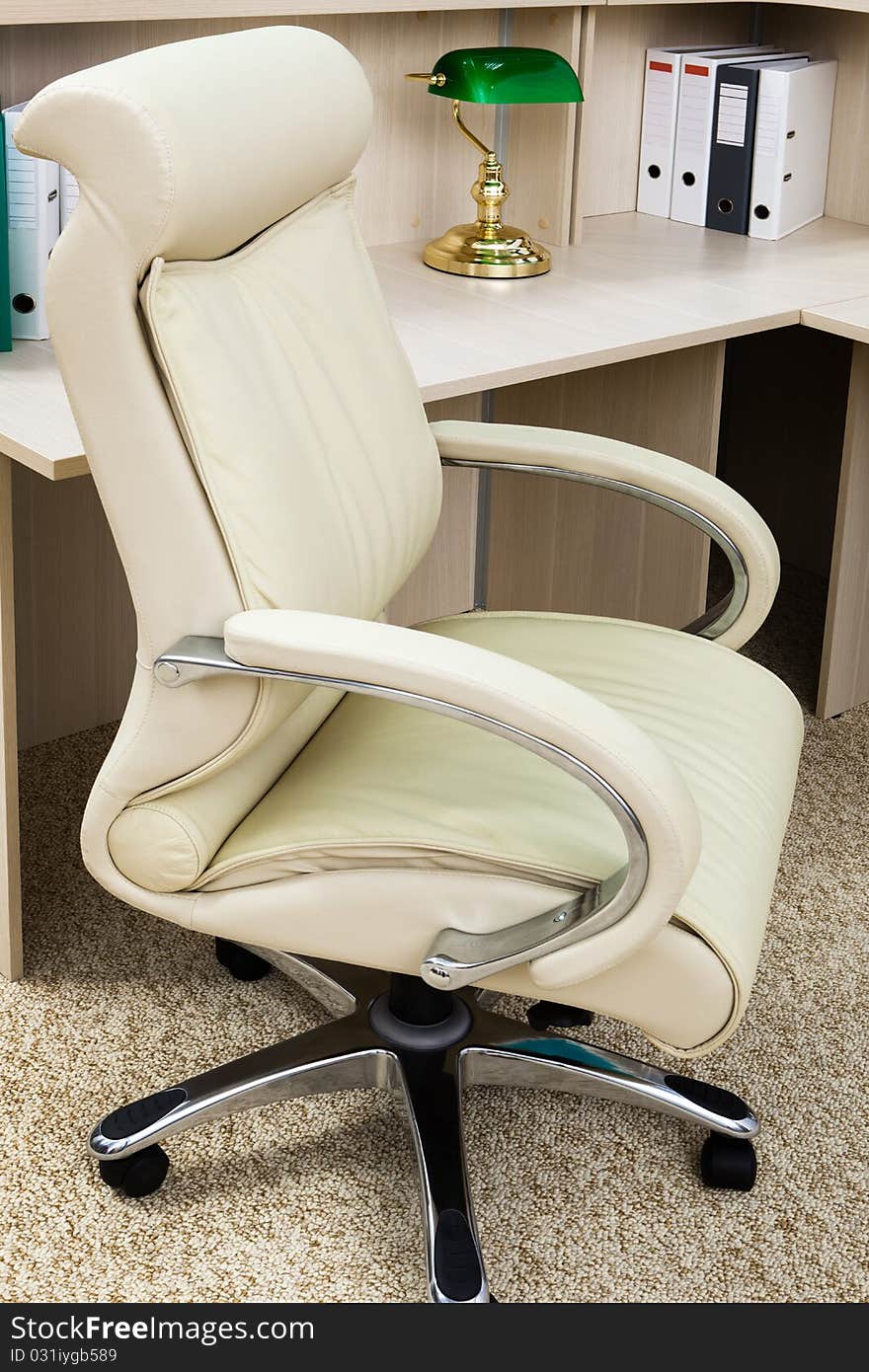 White leather armchair in a modern office