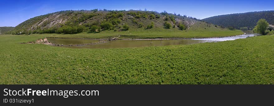 Beautiful panorama of Moldova (Orhei, Furceni) meadow with hills and a river. Beautiful panorama of Moldova (Orhei, Furceni) meadow with hills and a river