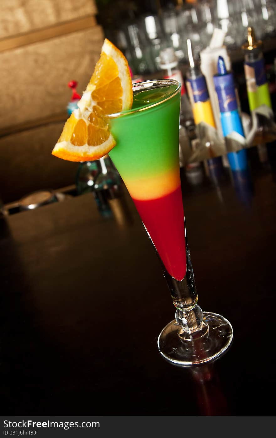 Colorful cocktail isolated on bar