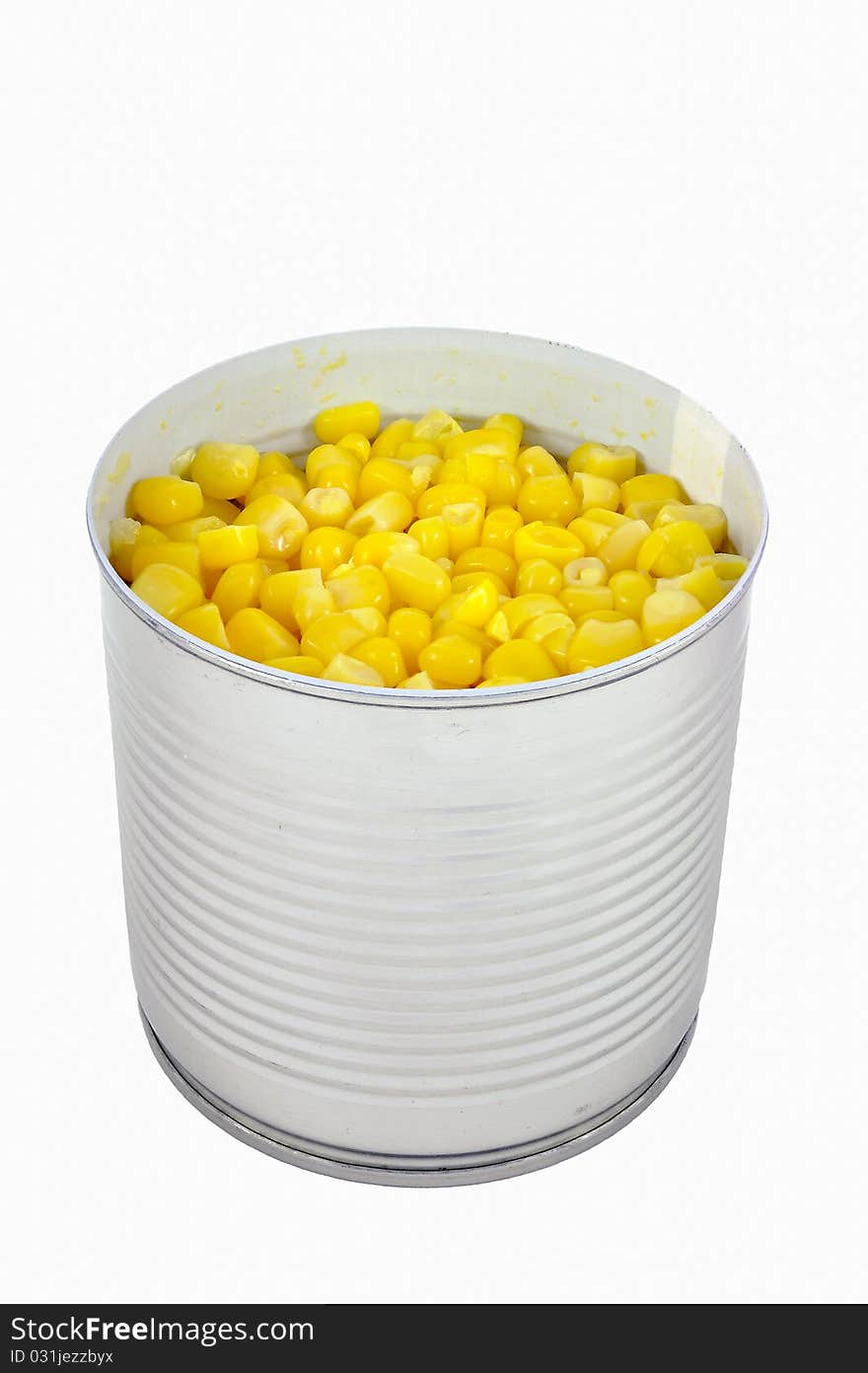 Open can of corn isolated over white background. Open can of corn isolated over white background.