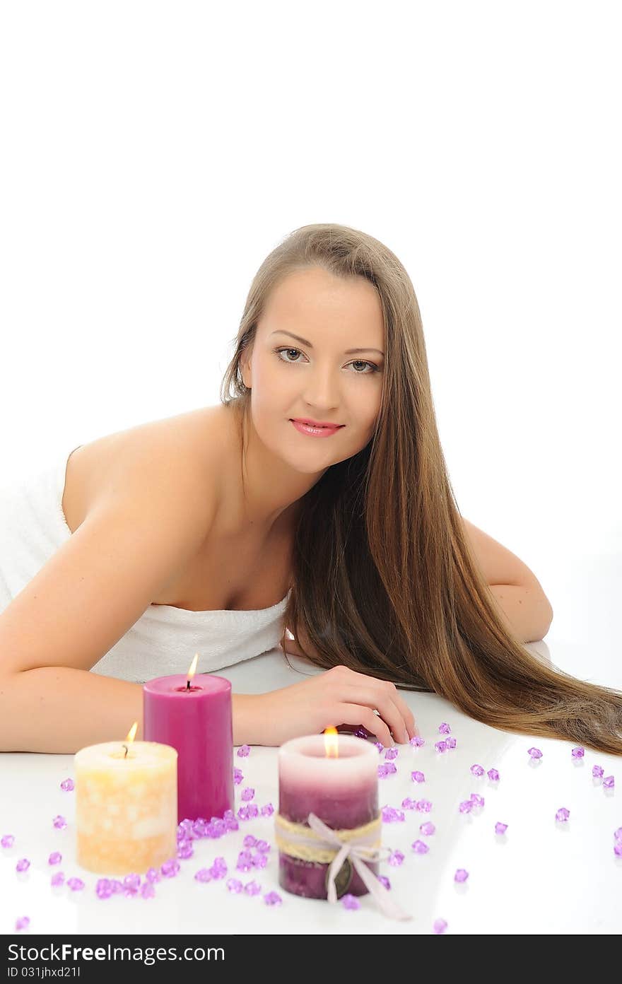 Beautiful woman with pure healthy skin and long hair in spa salon relaxing. isolated on white background. Beautiful woman with pure healthy skin and long hair in spa salon relaxing. isolated on white background