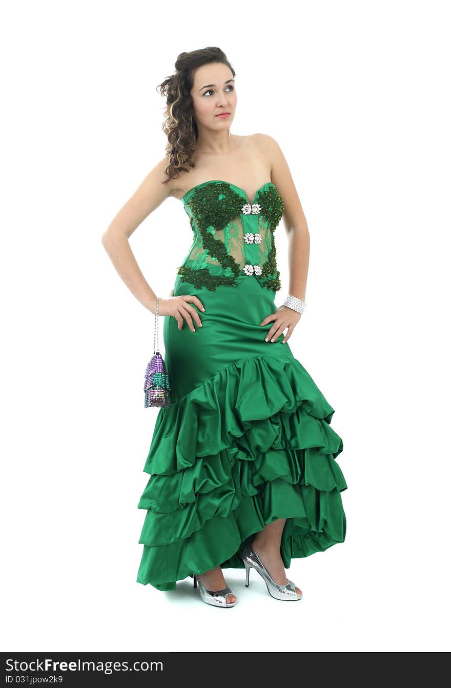 Attractive young woman in elegant green dress