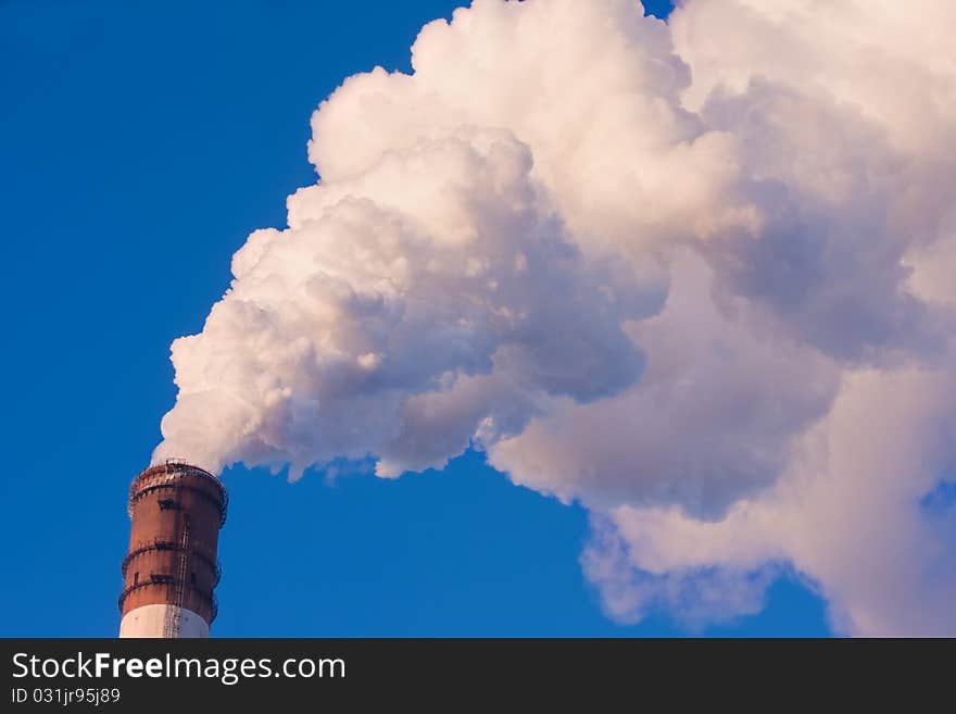 The smoke from the chimney power plant