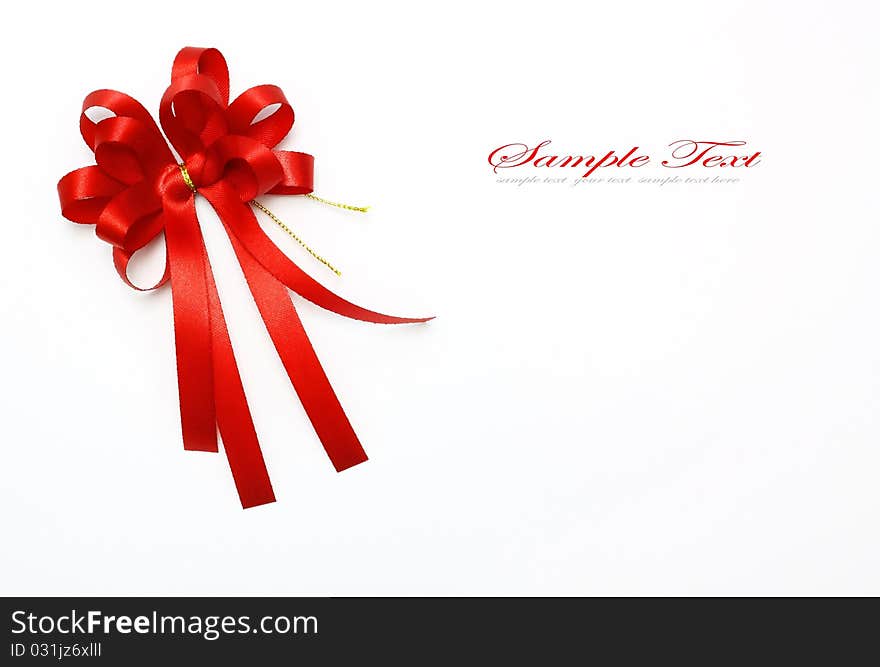 Red bow on white background