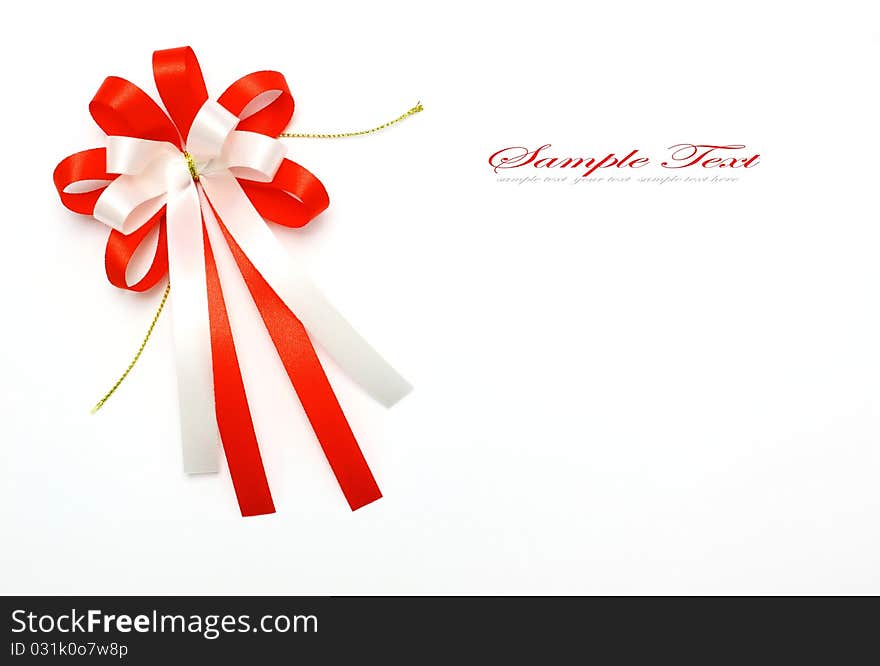 Red and white bow on white background. Red and white bow on white background