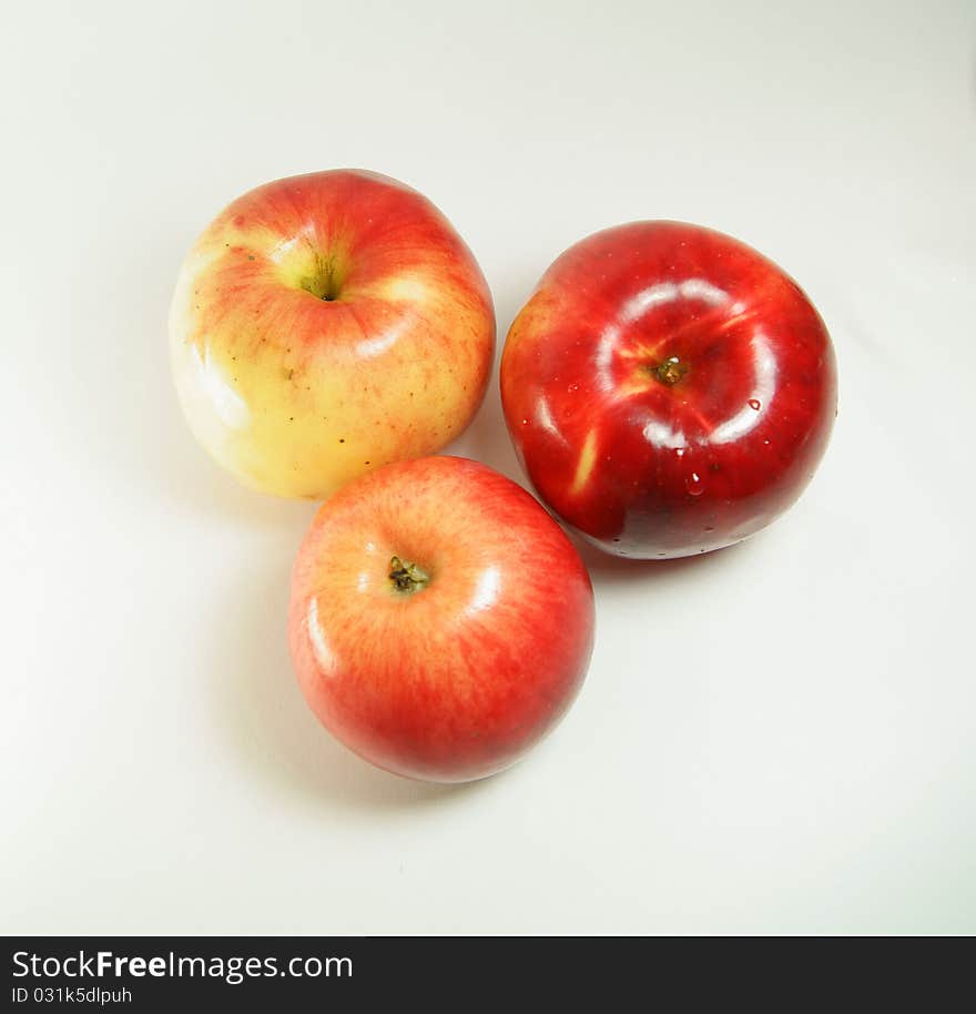 Ripe red apples on a dark background