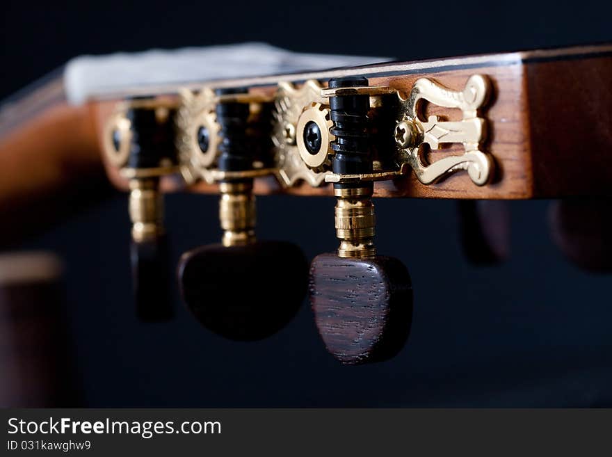 Neck of a guitar isolated on white. Neck of a guitar isolated on white