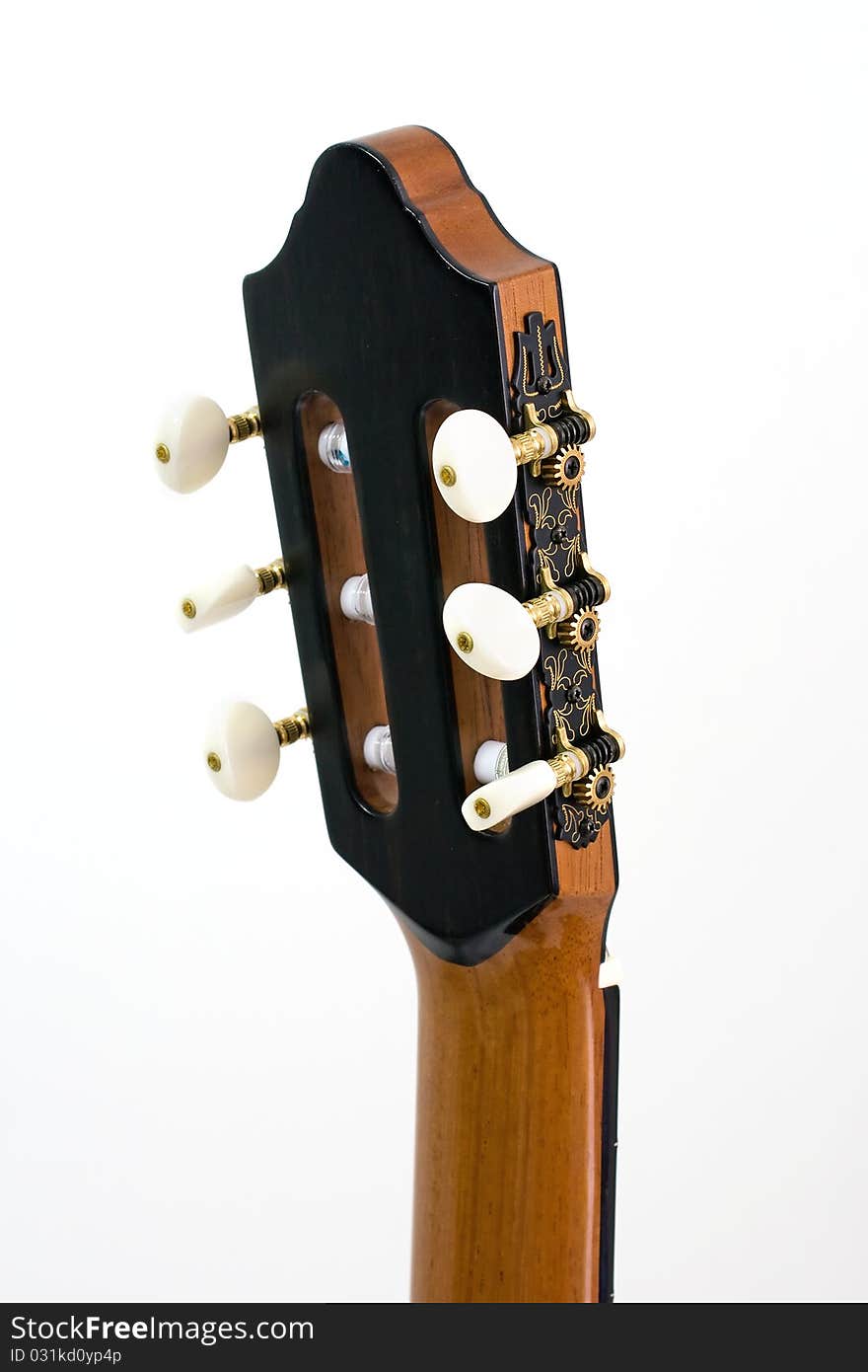 Neck of a guitar isolated on white. Neck of a guitar isolated on white