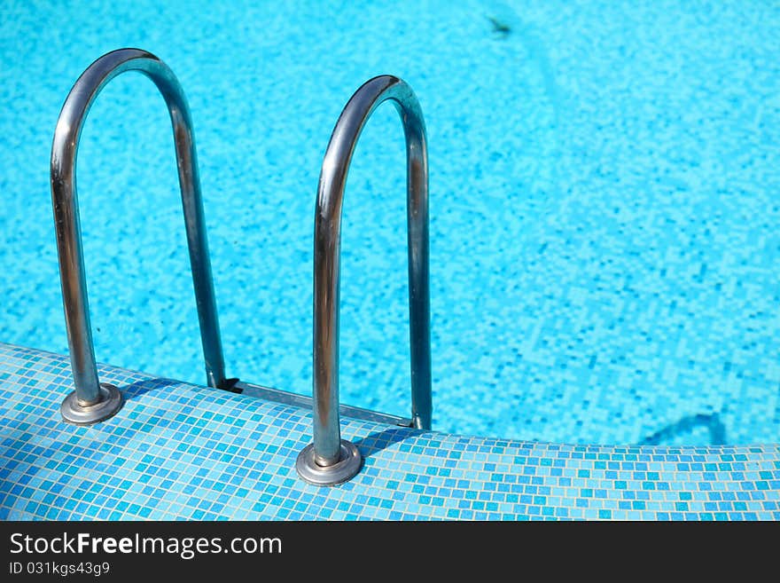 Picture of swimming pool with blue water. Picture of swimming pool with blue water