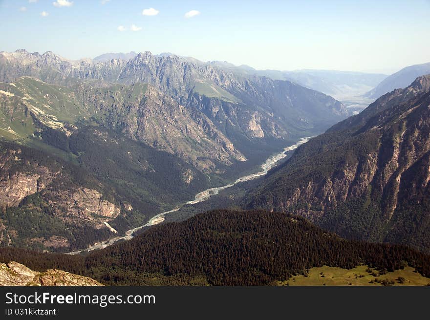 Kind on mountain gorge from mountain top. Kind on mountain gorge from mountain top