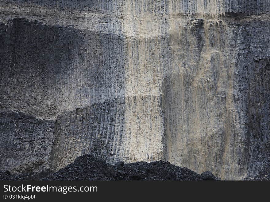 View at brown coal wall. The strip mine in the Czech Republic.