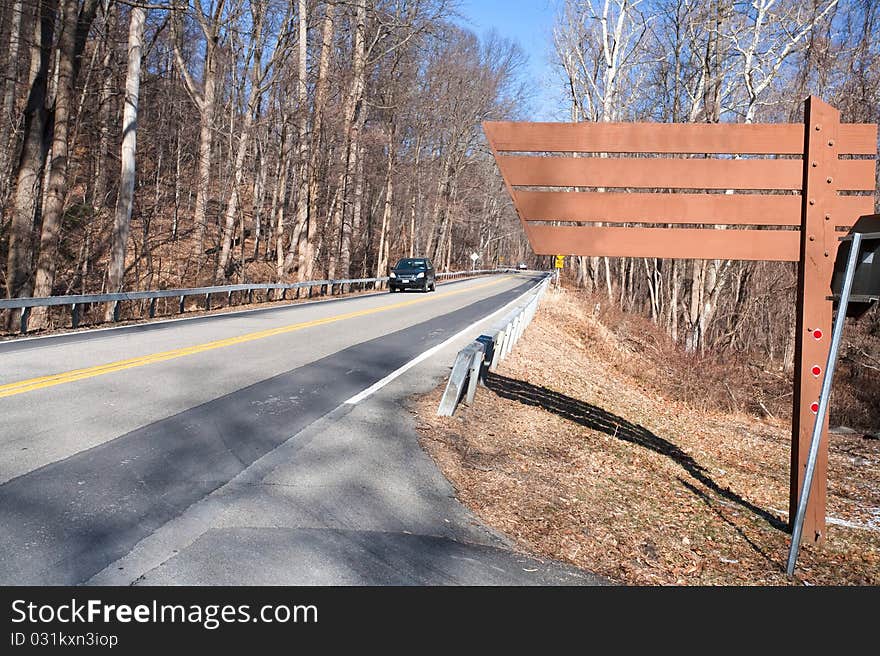 Wooden road sign in Croton park