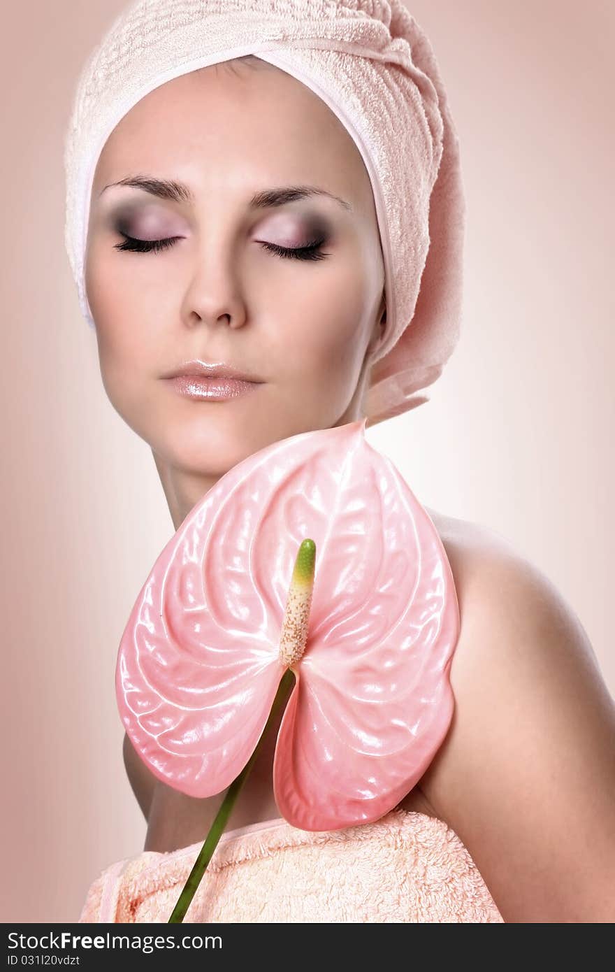 Young girl with pink flower. Young girl with pink flower